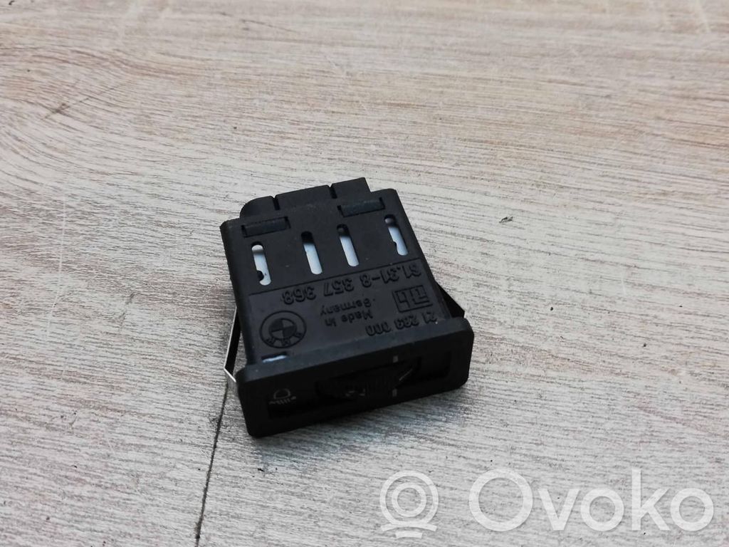 Headlight level height control switch   8357368