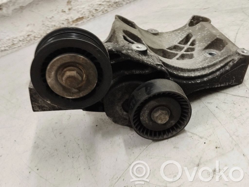 Opel Astra J Generator/alternator belt tensioner 