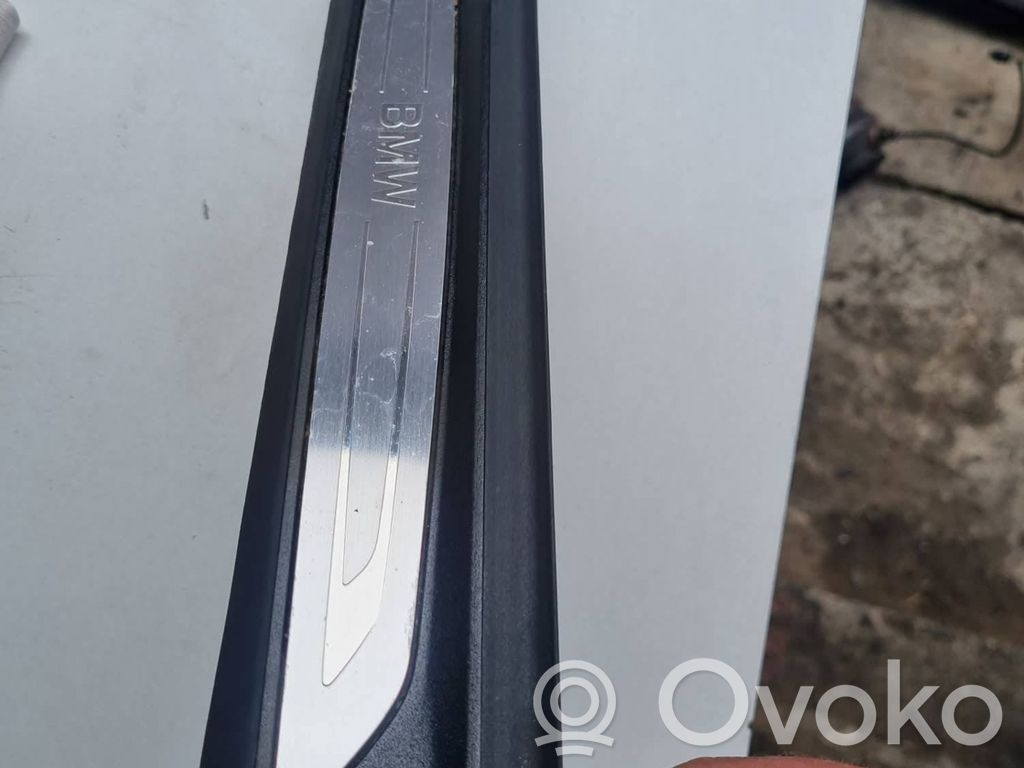 BMW 2 F46 Aizmugurējā sliekšņa dekoratīvā apdare (iekšējā) 