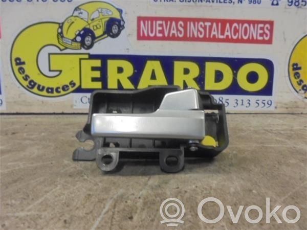 Manecilla interna puerta delantera