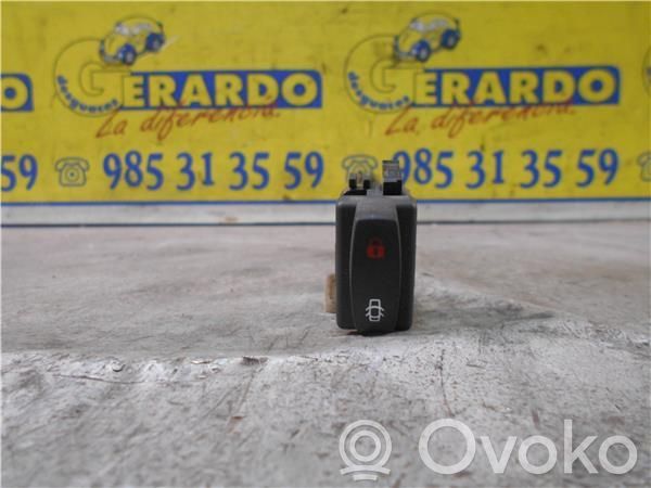 Botón interruptor de bloqueo de puertas