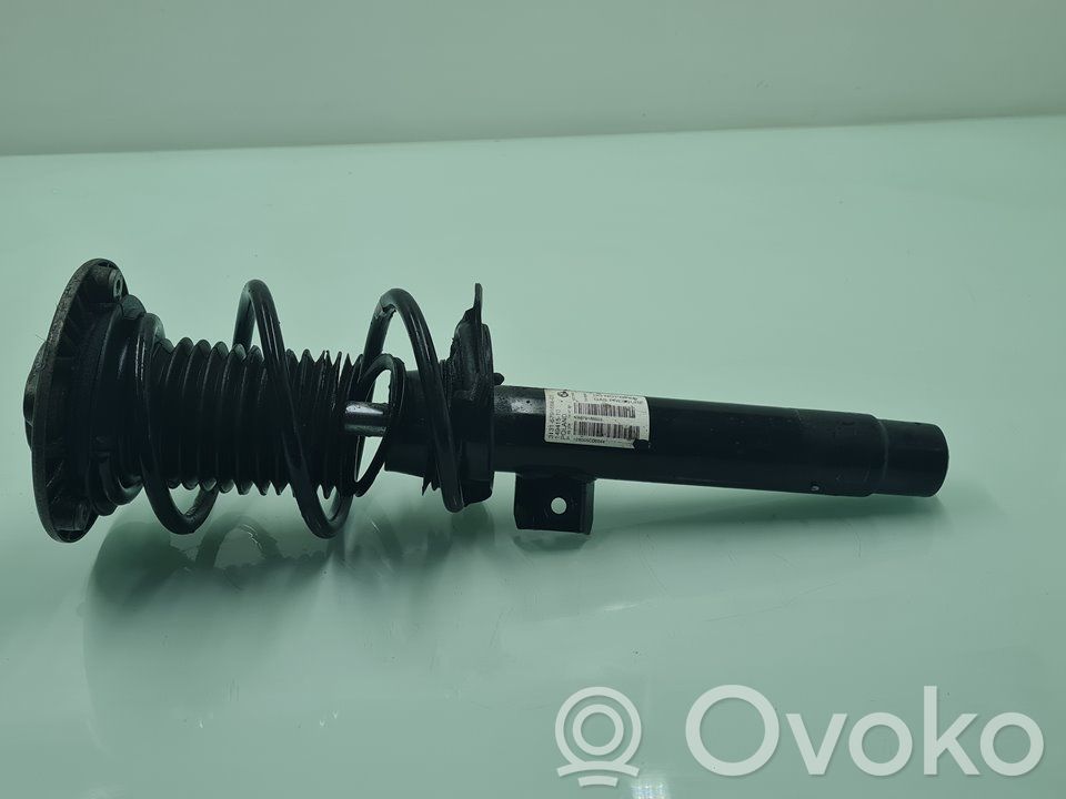 Front shock absorber with coil spring   6791665