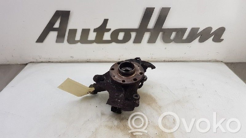 Opel Corsa D Zwrotnica koła przedniego 