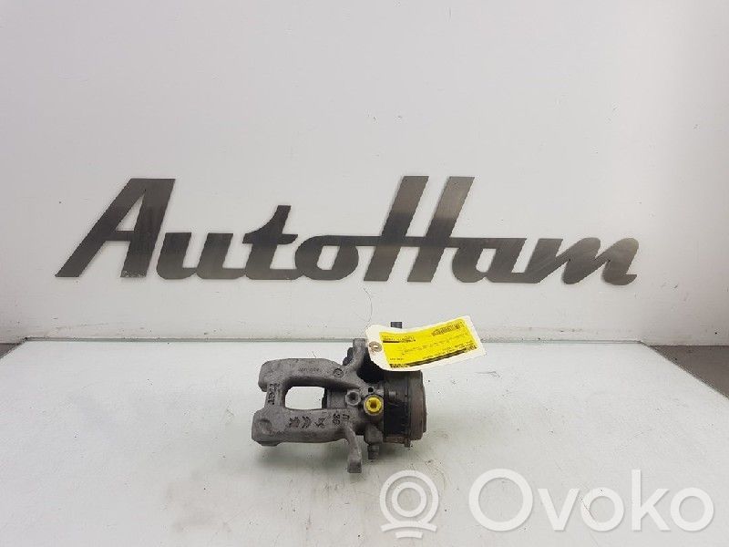 Opel Corsa F Tylny zacisk hamulcowy 