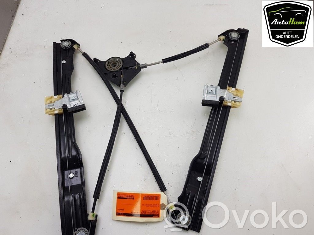 Volkswagen Caddy Manualny podnośnik szyby drzwi przednich 