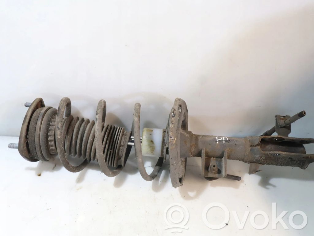 Front shock absorber with coil spring