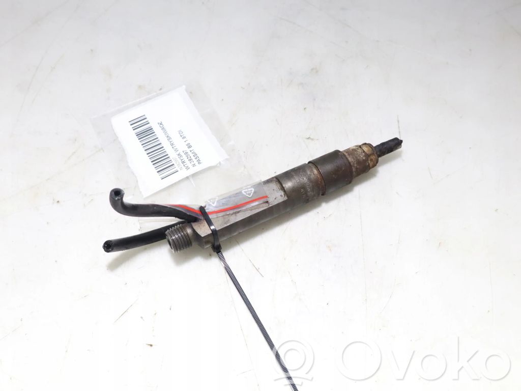 Inyector de combustible