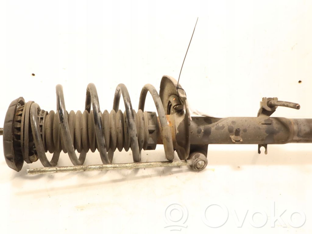 Peugeot 208 I Front shock absorber with coil spring 