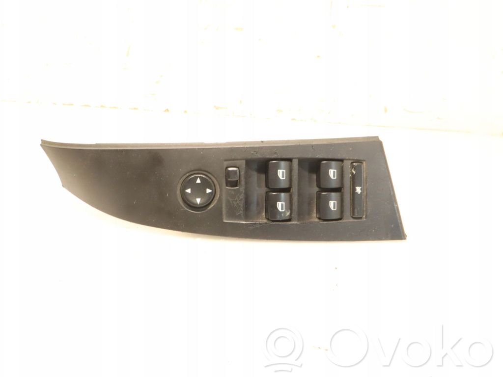 Electric window control switch   6951904