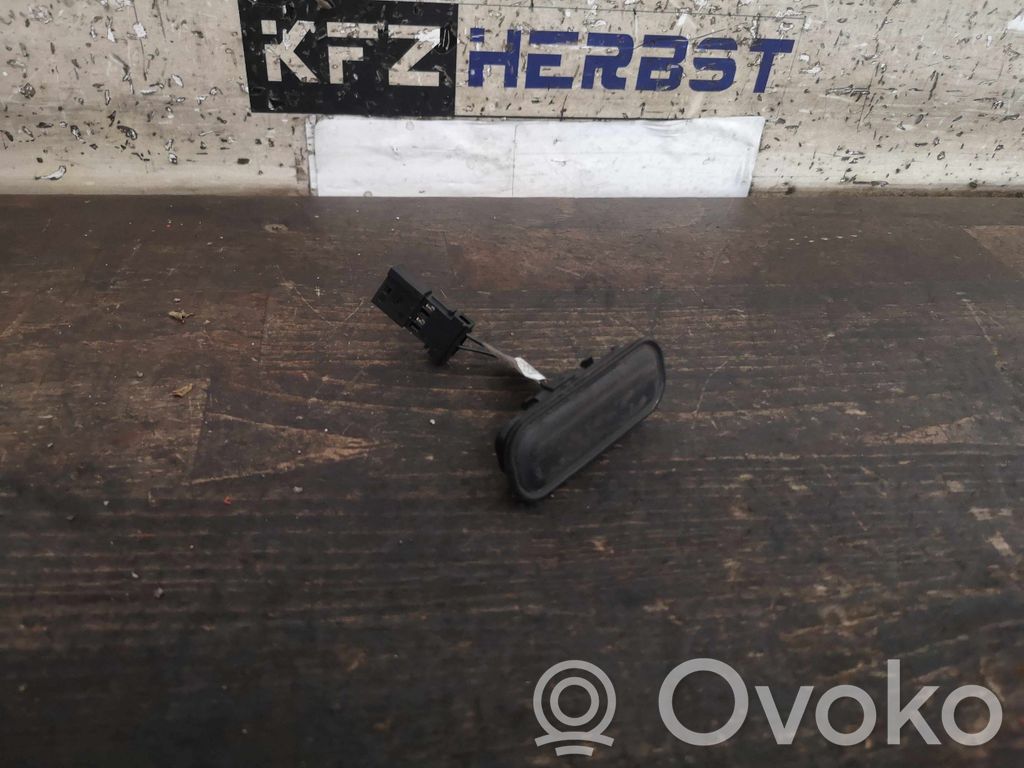 Opel Astra J Fuel tank opening switch 
