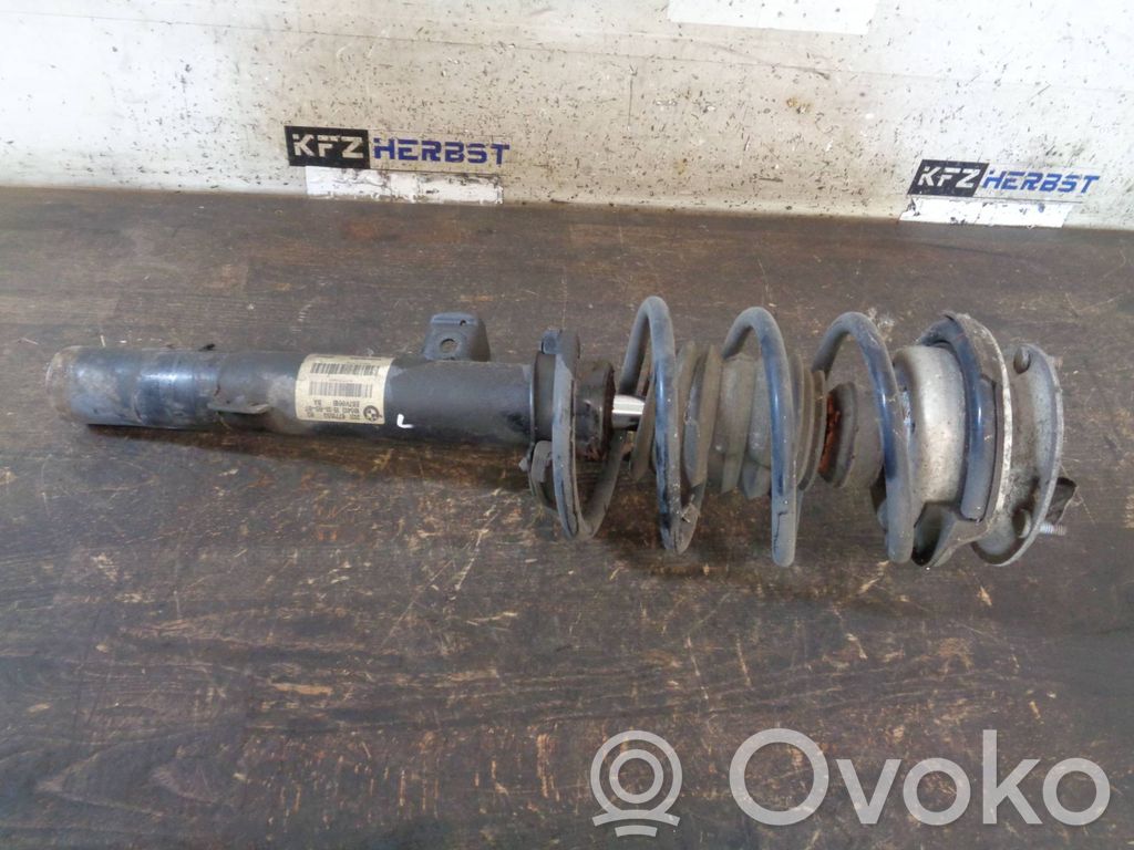 BMW 1 E81 E87 Front shock absorber with coil spring 
