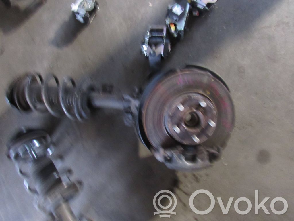Front wheel hub spindle knuckle
