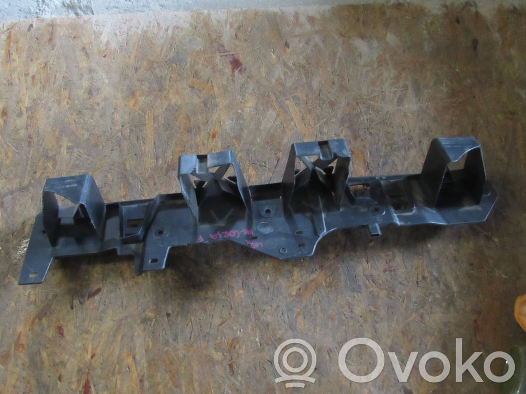 Opel Corsa F Uchwyt / Mocowanie zderzaka tylnego 