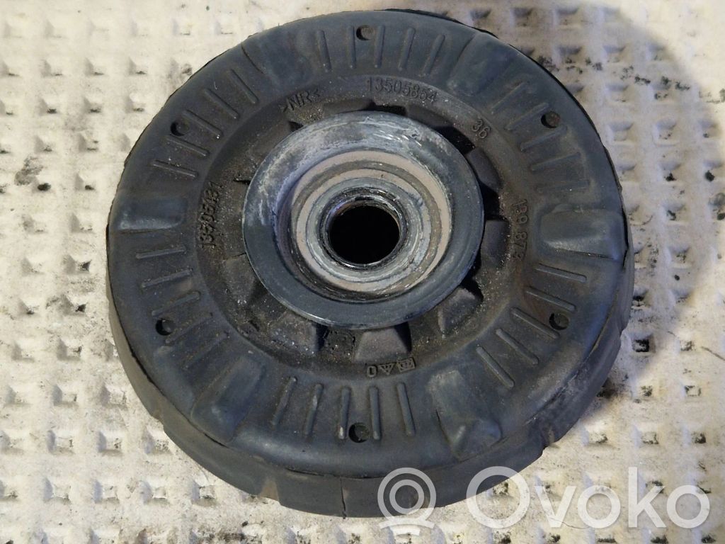 Opel Astra J Górne mocowanie amortyzatora przedniego 