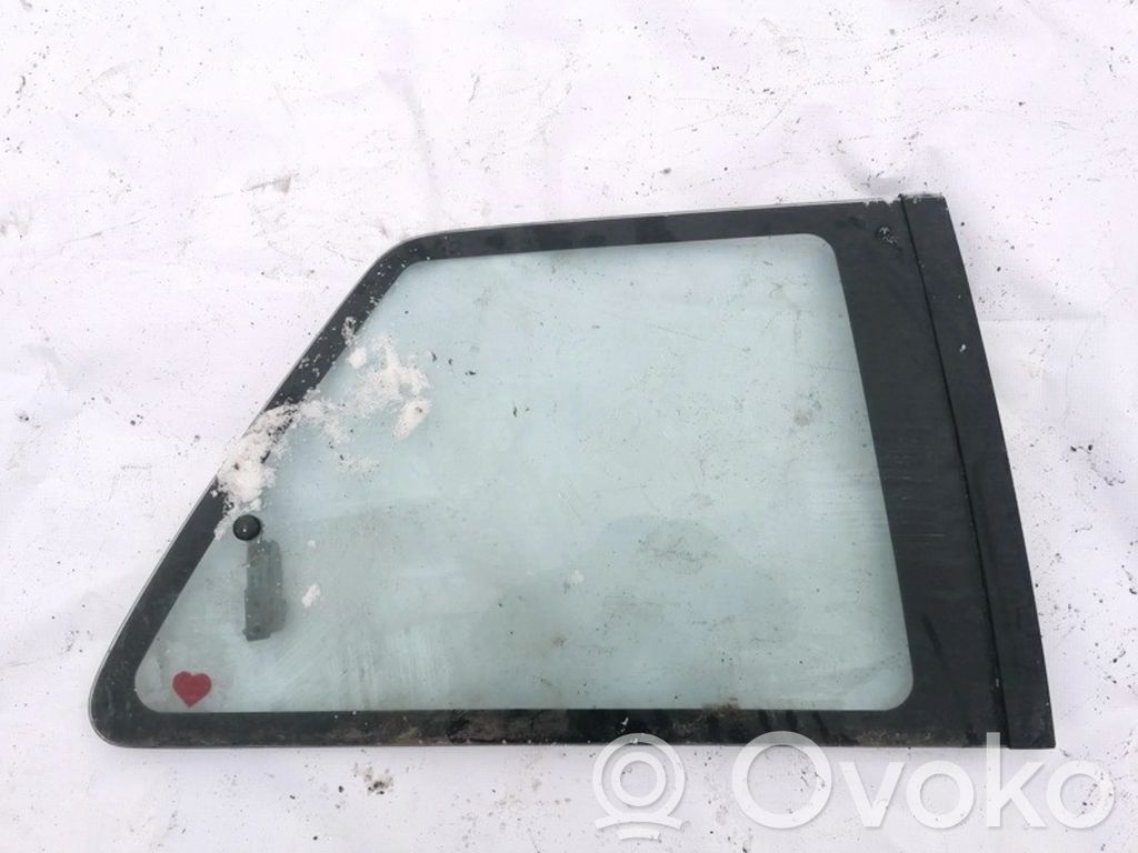 Mazda 323 Geam lateral spate 