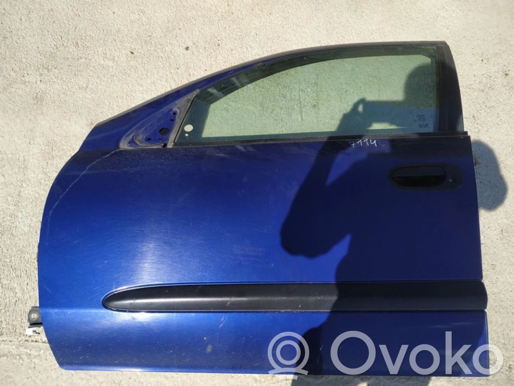 Nissan Almera N16 Drzwi przednie
