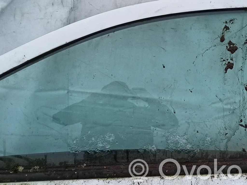Opel Astra H Szyba drzwi przednich 
