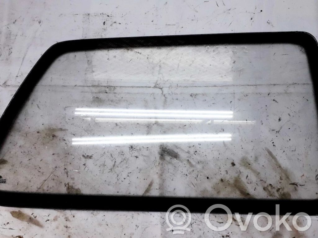 Vidrio lateral trasero