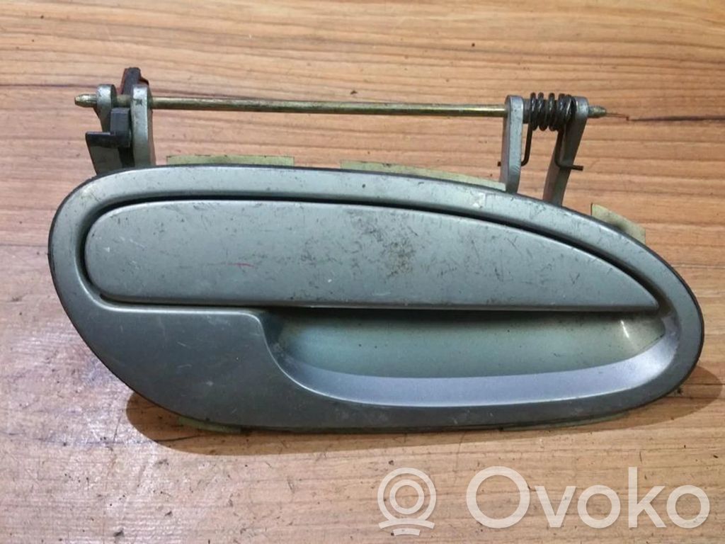 Opel Omega B1 Manecilla externa puerta delantera 