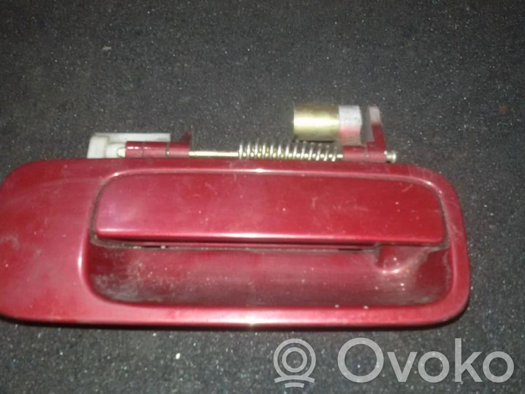 Manecilla externa puerta delantera