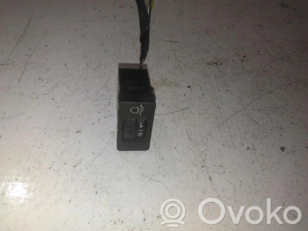 Bouton commande réglage hauteur de phares