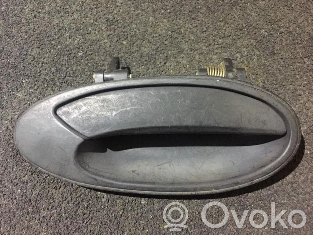 Mitsubishi Lancer Manecilla externa puerta delantera 