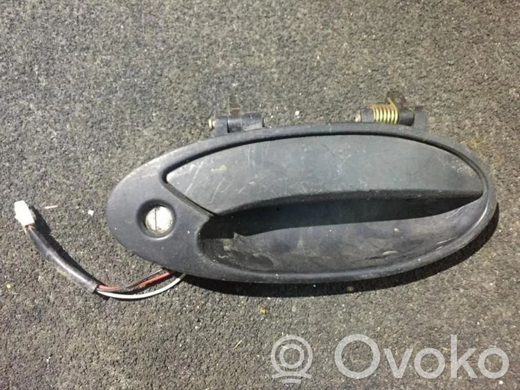 Mitsubishi Lancer Manecilla externa puerta delantera 