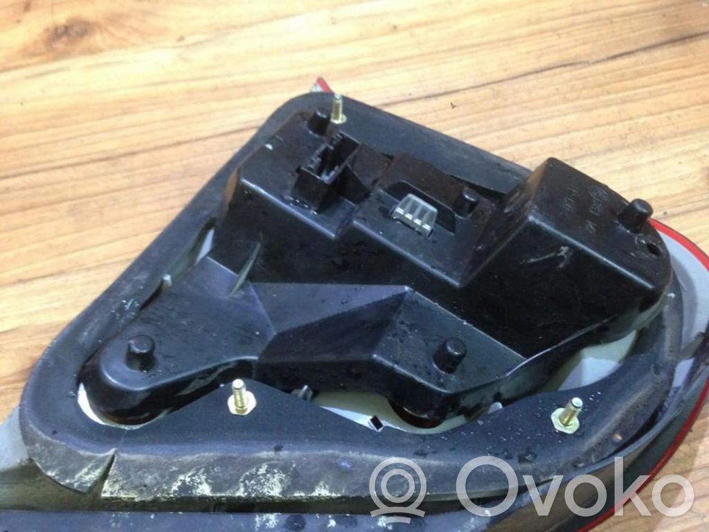 Rover 75 Takavalon polttimon suojan pidike 