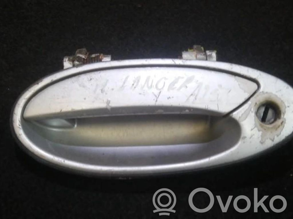 Mitsubishi Lancer Manecilla externa puerta delantera 