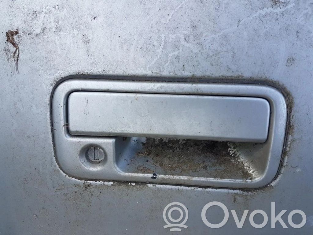 Manecilla externa puerta delantera