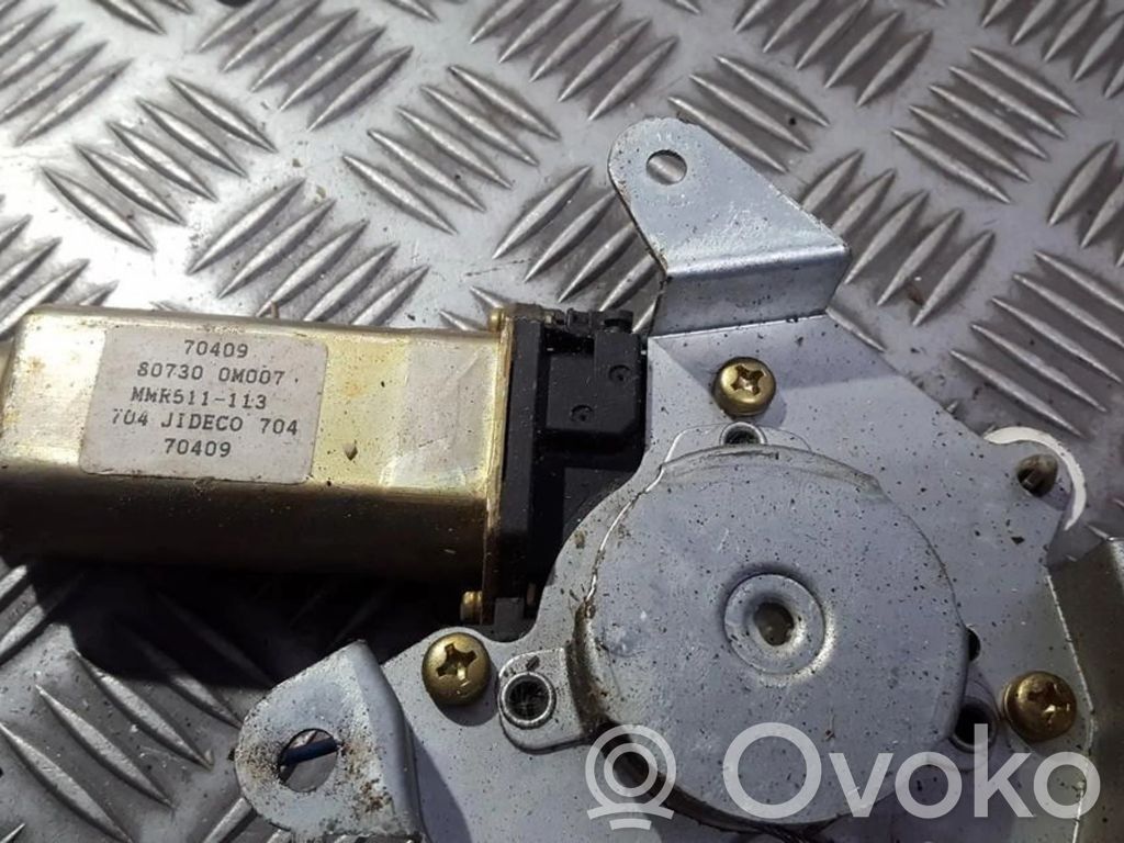 Nissan Almera Silnik regulatora szyby drzwi przednich 