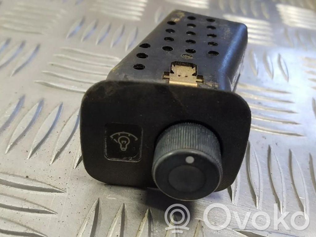 Panel lighting control switch