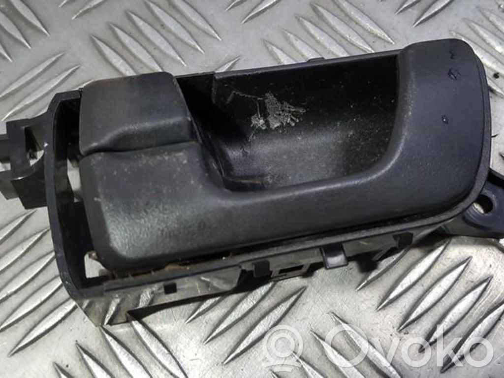 Mitsubishi Pajero Manecilla interna puerta delantera 