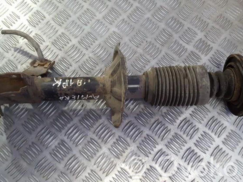 Nissan Almera N16 Amortyzator przedni 