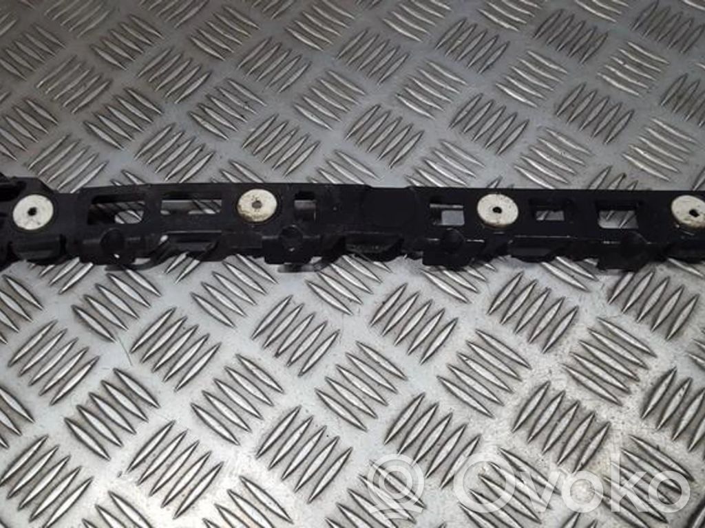 Rear bumper mounting bracket