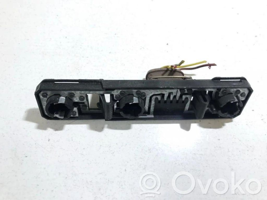 Peugeot 306 Takavalon polttimon suojan pidike 