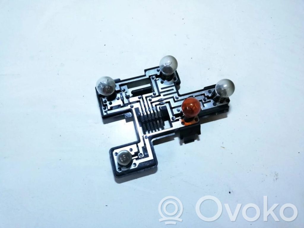 Takavalon polttimon suojan pidike   GM5075,GM5075