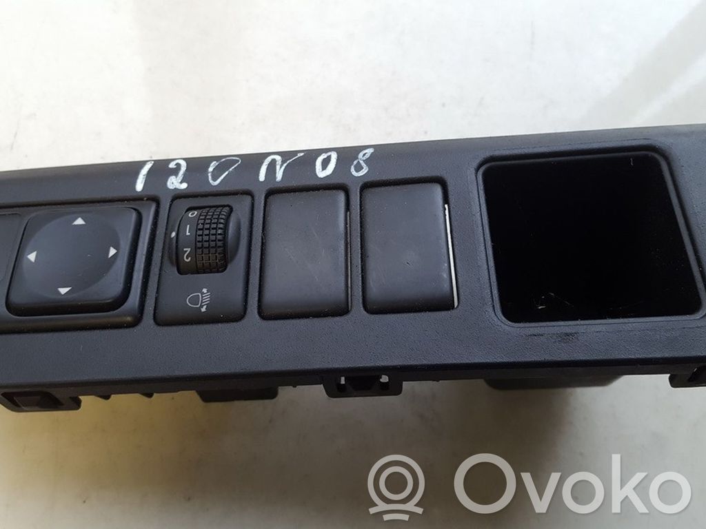 Nissan Note (E11) Interruttore di regolazione livello altezza dei fari 