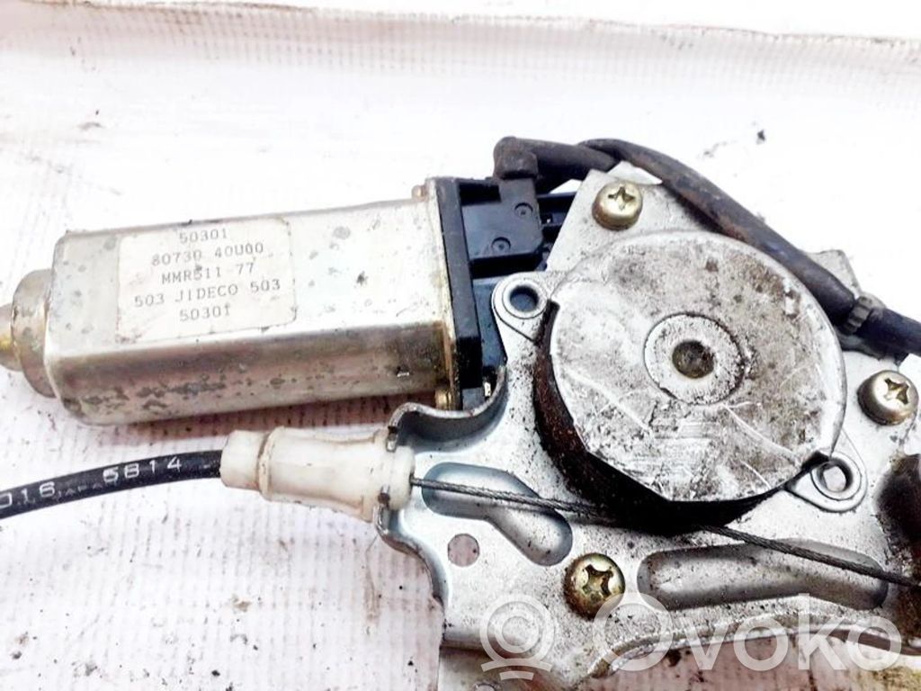Nissan Maxima Silnik regulatora szyby drzwi przednich 