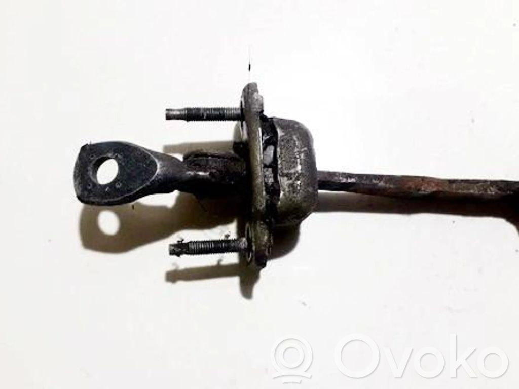 Front door check strap stopper