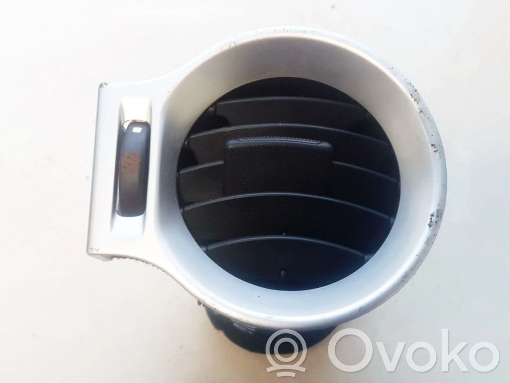 Renault Koleos I Rejilla de ventilación central del panel 