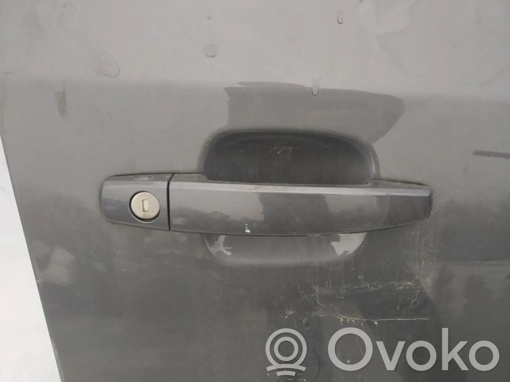Manecilla externa puerta delantera