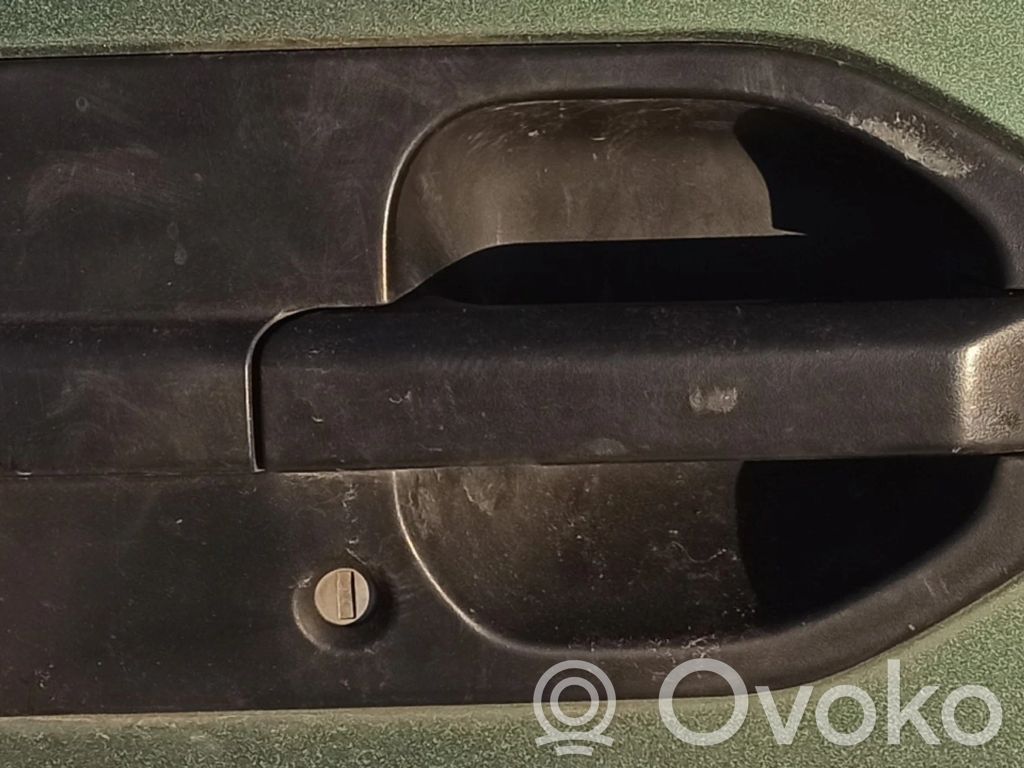 Manecilla externa puerta delantera