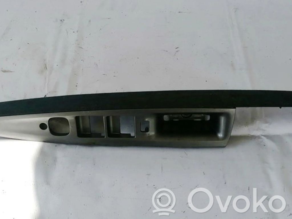 Mazda 2 Front door window switch trim 