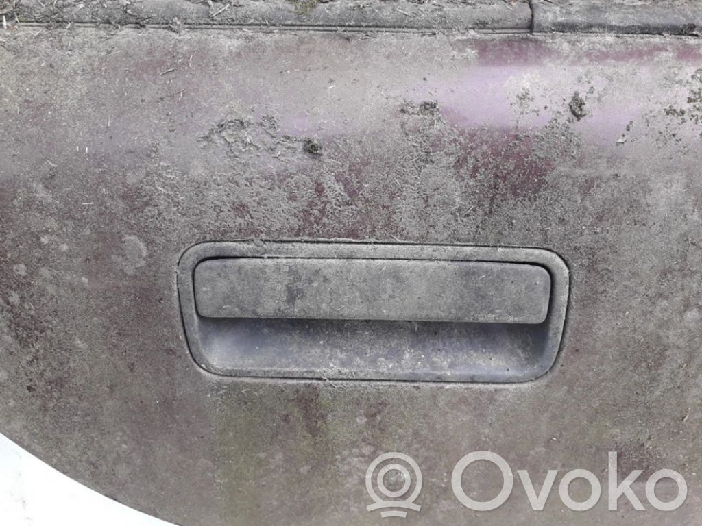 Manecilla externa puerta delantera