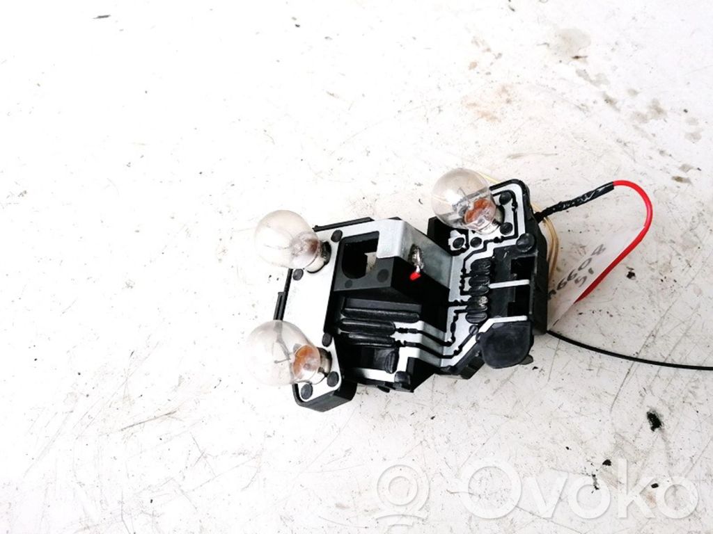 Peugeot 206 Takavalon polttimon suojan pidike