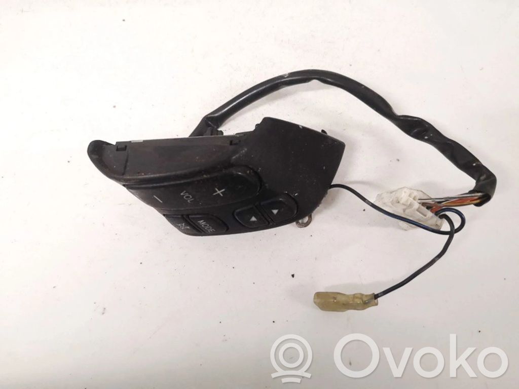 Mazda 3 I Boutons / interrupteurs volant