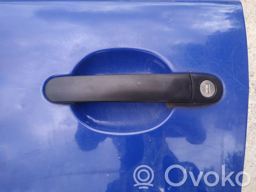 Manecilla externa puerta delantera