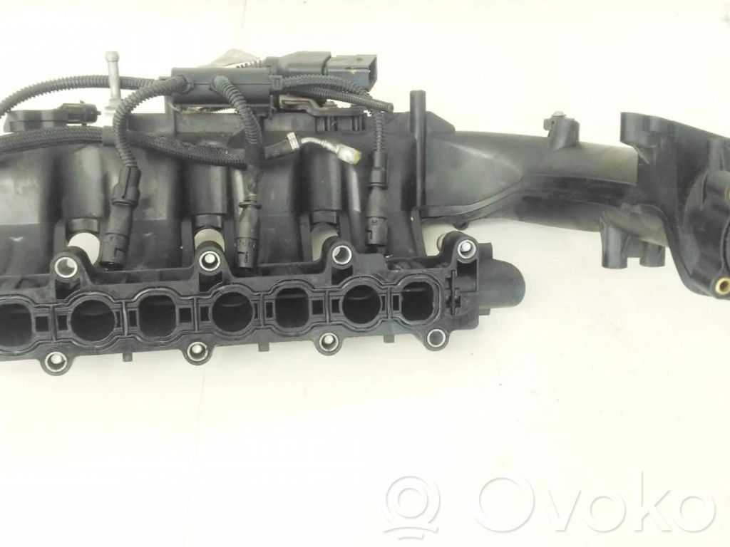 Opel Astra J Kolektor ssący 