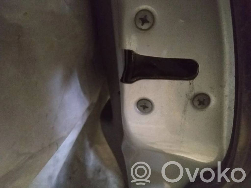 Cerradura de puerta trasera